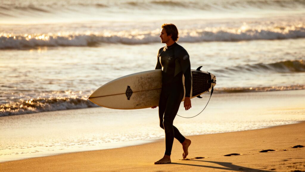 Surfer Walking Along Malibu Beach - Пример 1