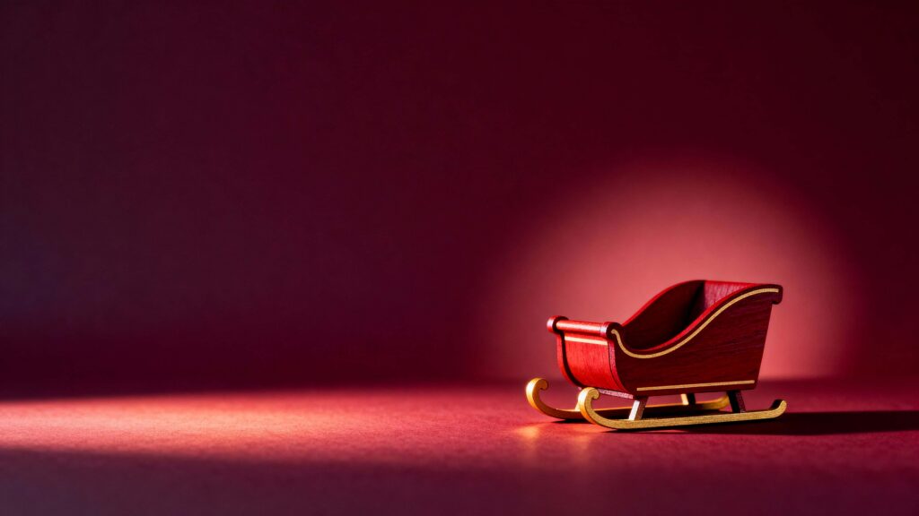 Wooden sleigh on wine-red backdrop - Пример 1